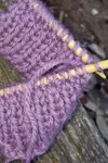 If you are planning to knit garments sooner or later you will need to master the 1x1 rib knitting stitch pattern as it is often a feature of jumpers or cardigans and it is also used for knitting scarves.